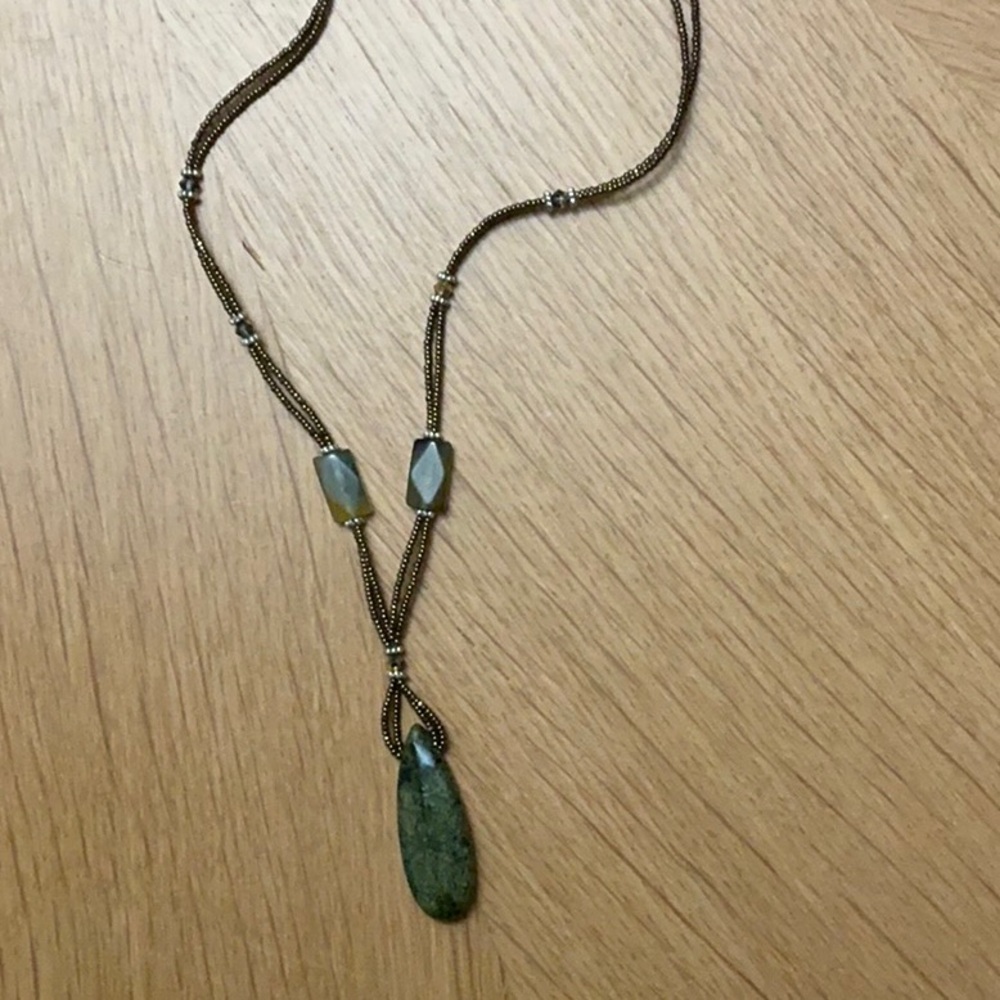 Jade necklace with beads snd crystals.  20 inches and has an extender.